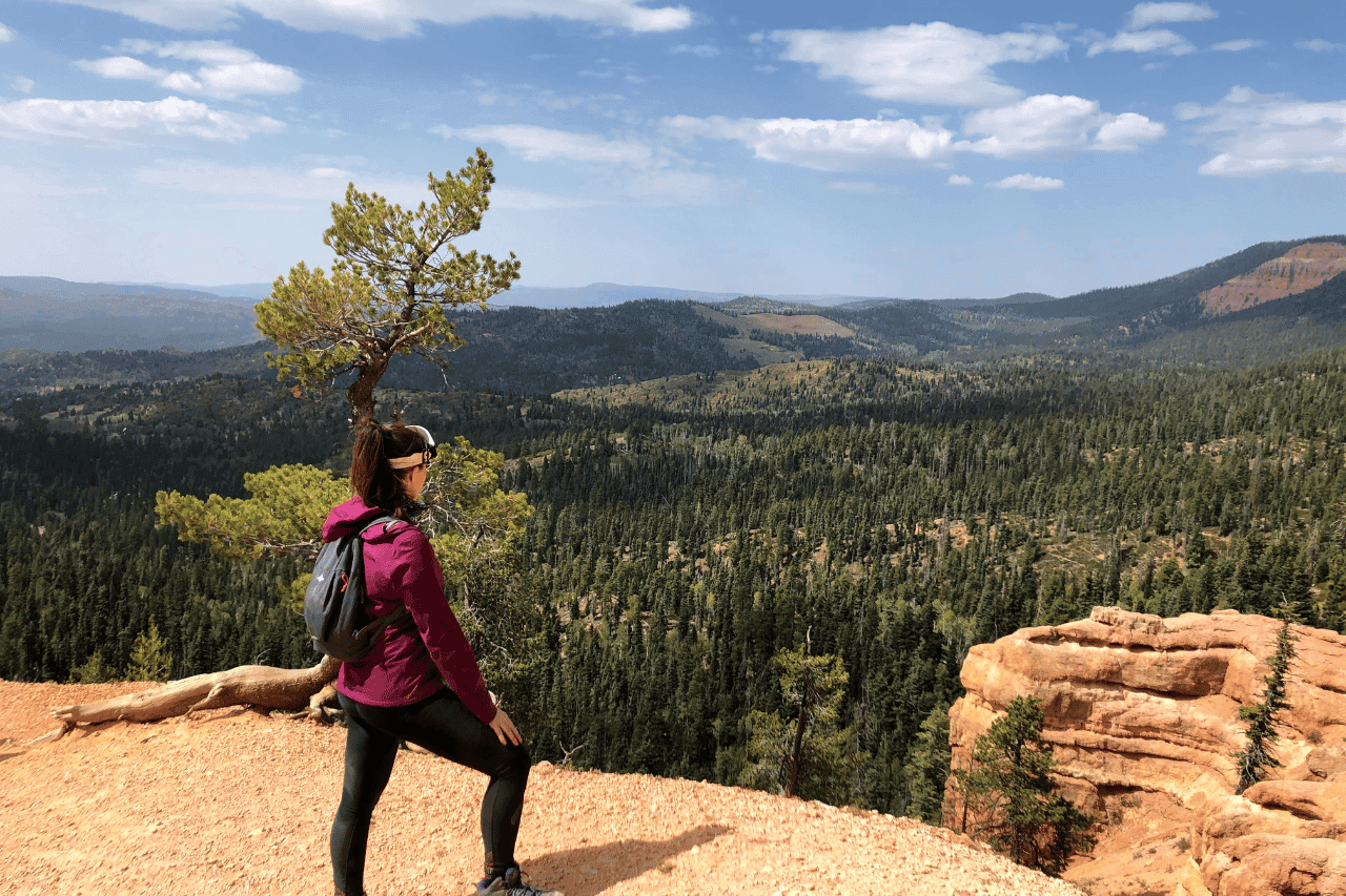 woman overlooking orange mountains in utah