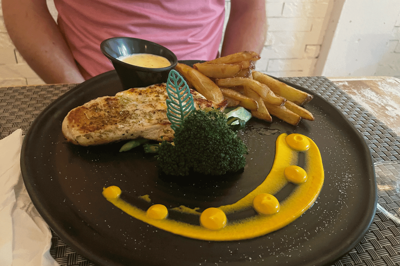 chicken with orange sauce and fries