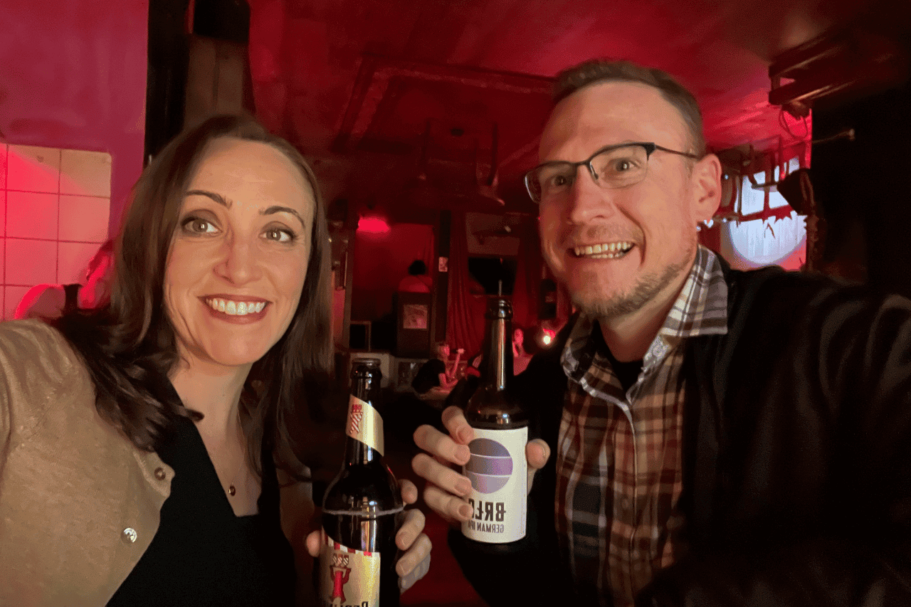 two people enjoying beer