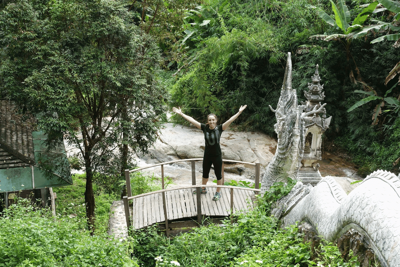 woman standing on a bridge in the best place to travel in thailand, Chiang Mai 