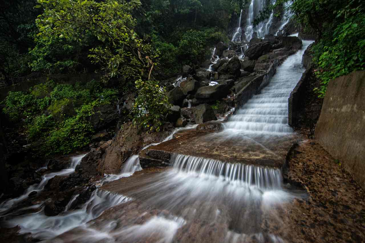 Serene Amboli Waterfall amidst lush Sahyadri hills, Maharashtra, India