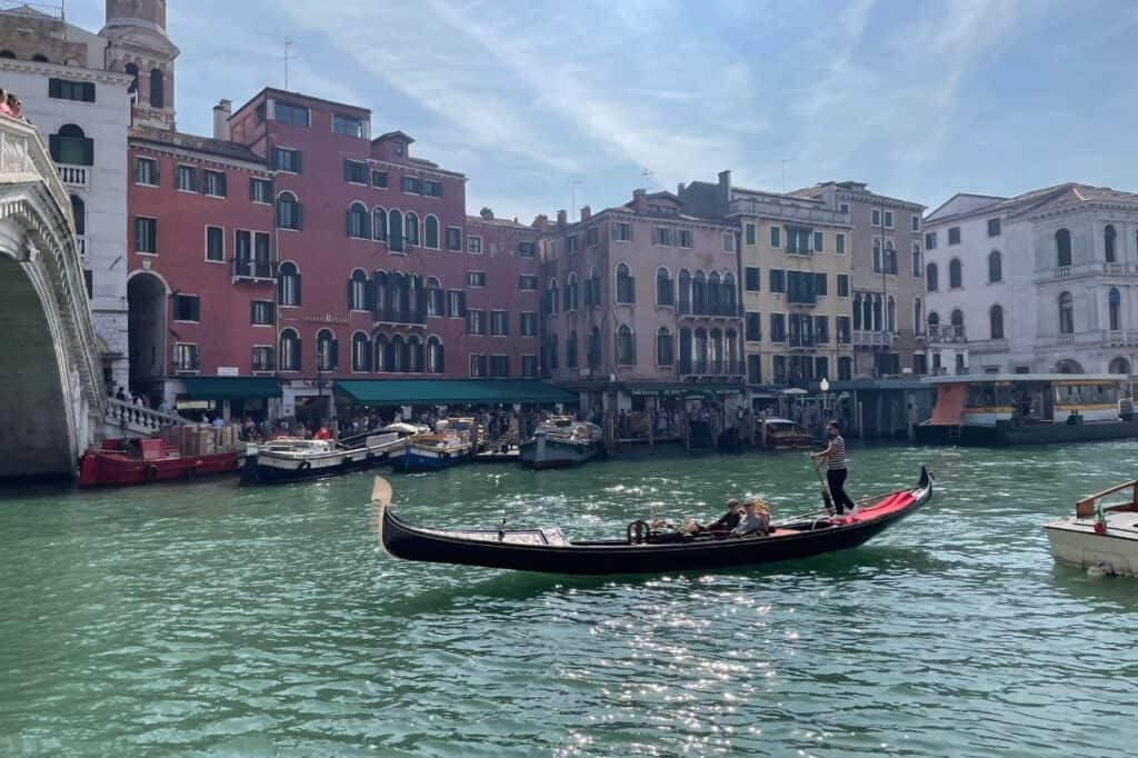 one gondola in the grand canal in venice italy