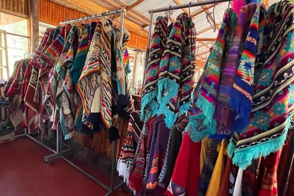 colorful shawls made out of alpaca wool hanging