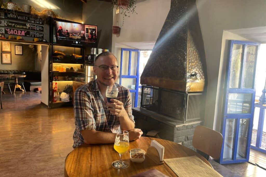 man drinking a craft beer