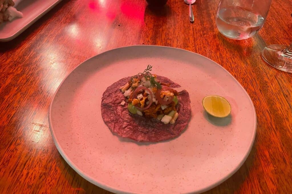 ceviche inside of a beet taco sheet