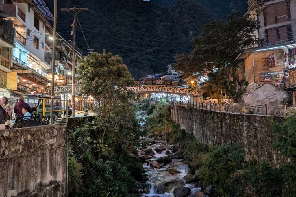 night view of the river in aguas calientes