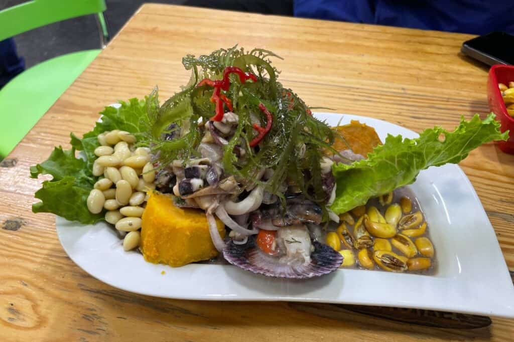 A large plate of fresh seafood served on the Lima food tour