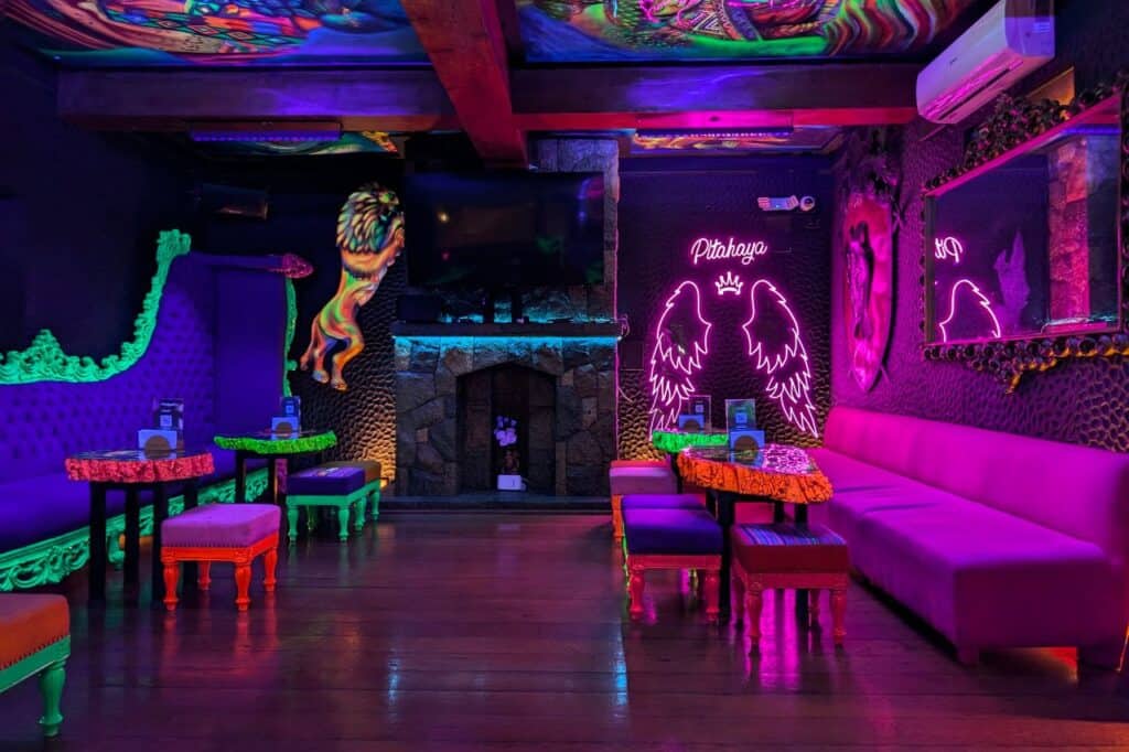 A colorful bar with neon lights