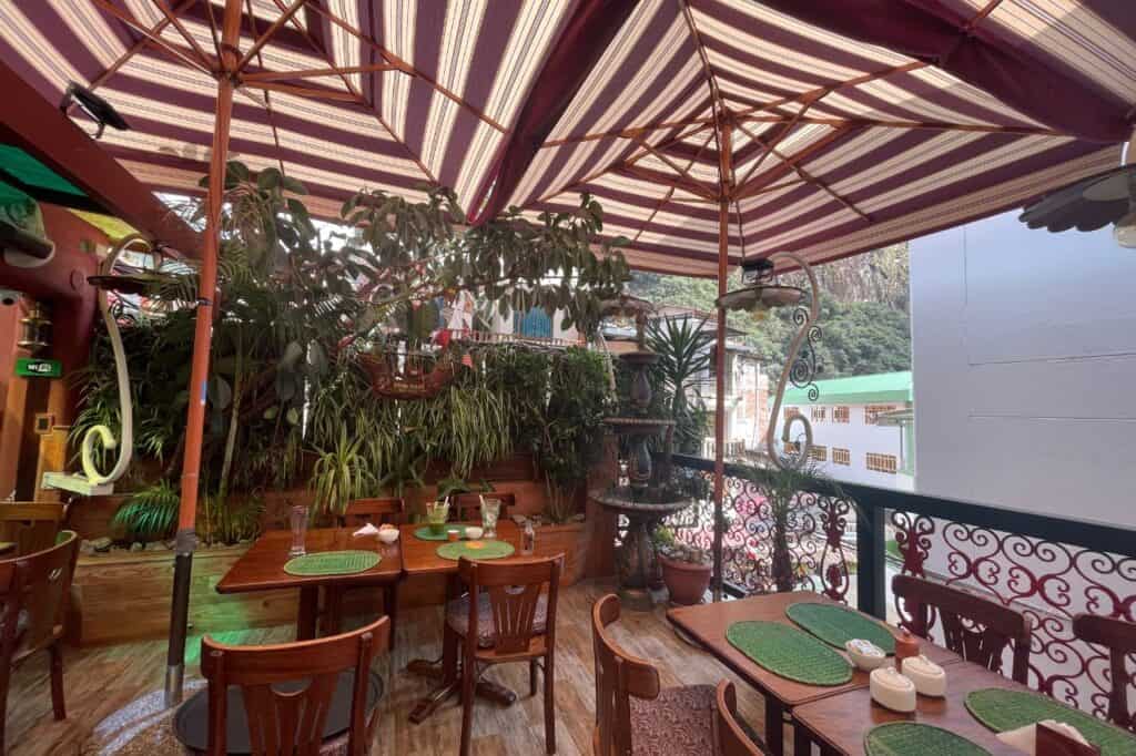 Outdoor seating in a local Aguas Calientes cafe