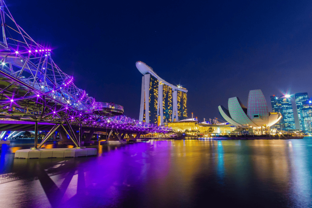 Singapore skyline light up in purple and green hues