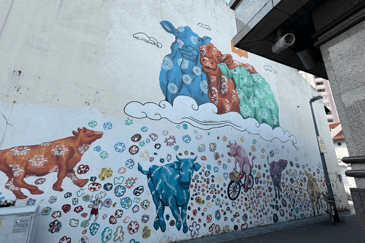 Vibrant mural of Little India with colorful cows