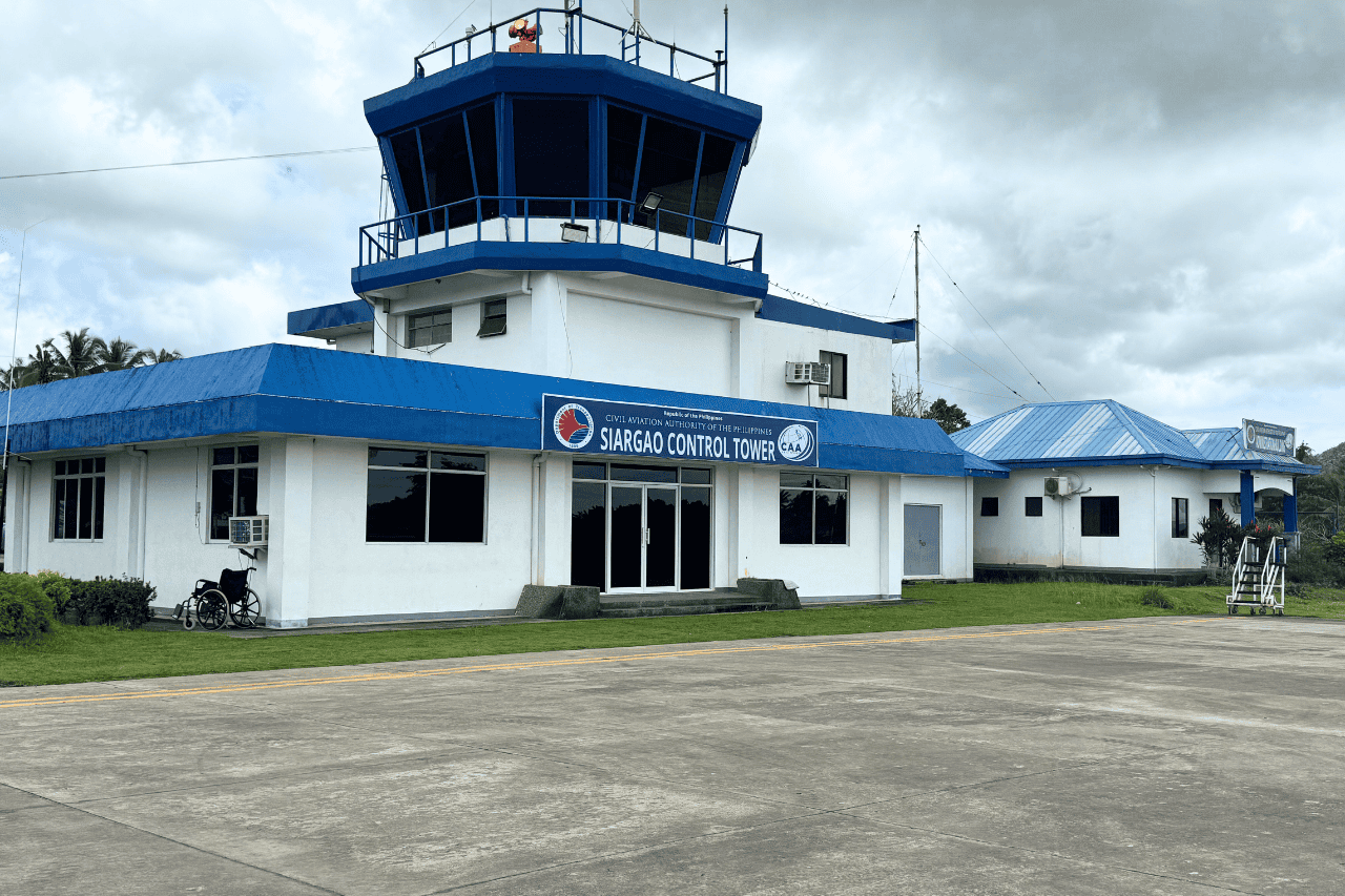 The airport in Siargao control tower painted in blue and white