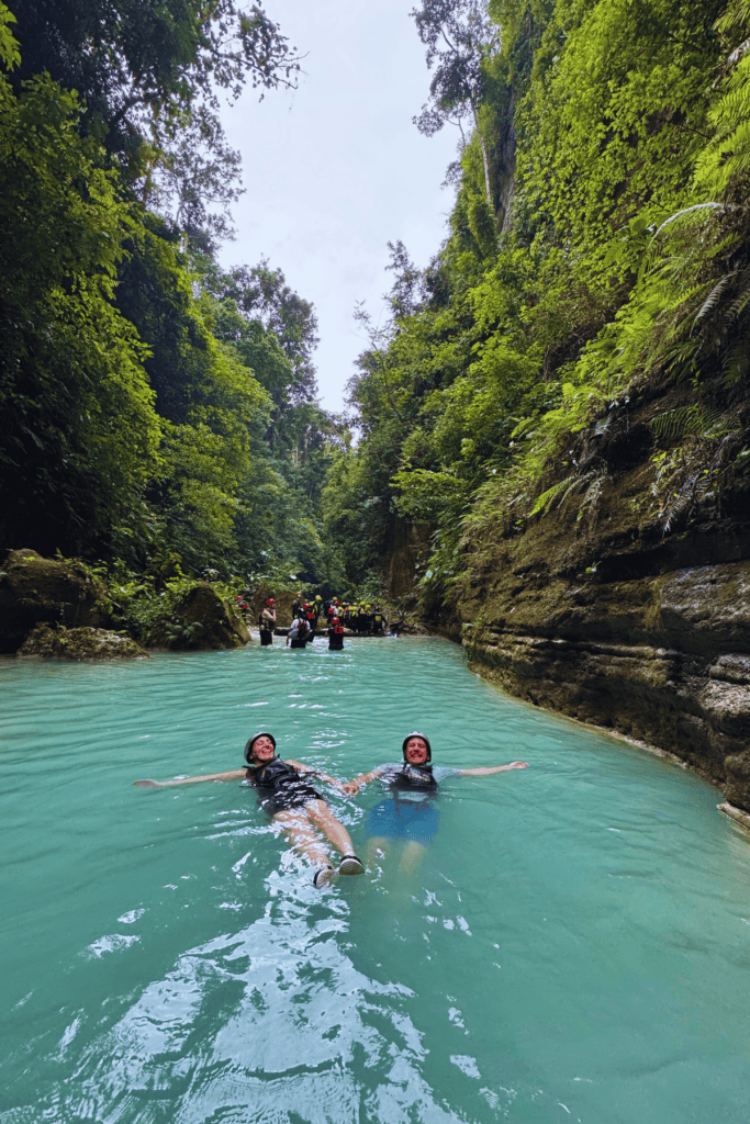 Crystal-clear blue waters of Kawasan Falls, perfect for swimming after an adrenaline-filled adventure