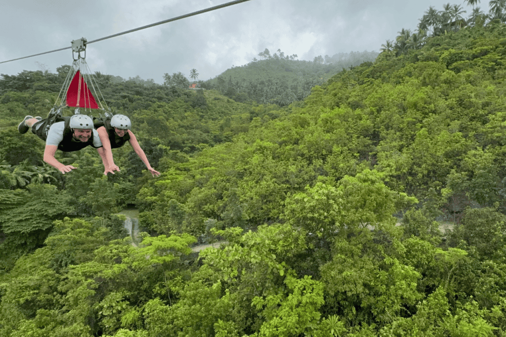 A thrilling zipline ride over the jungle leading to the start of the canyoneering experience in Moalboal