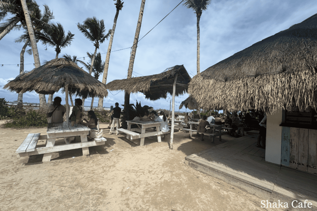 Outdoor seating overlooking the ocean at Shaka Café in Siargao