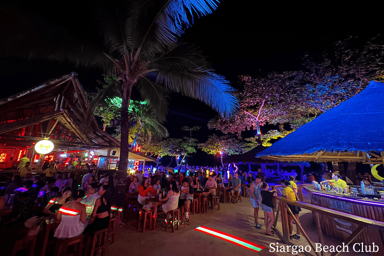 After sunset beach party at Siargao Beach Club with cocktails and DJs