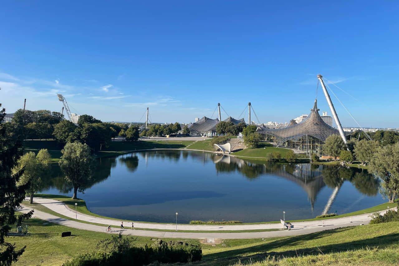 Aerial view of Olympia Park in Munich, showcasing its modern design and greenery