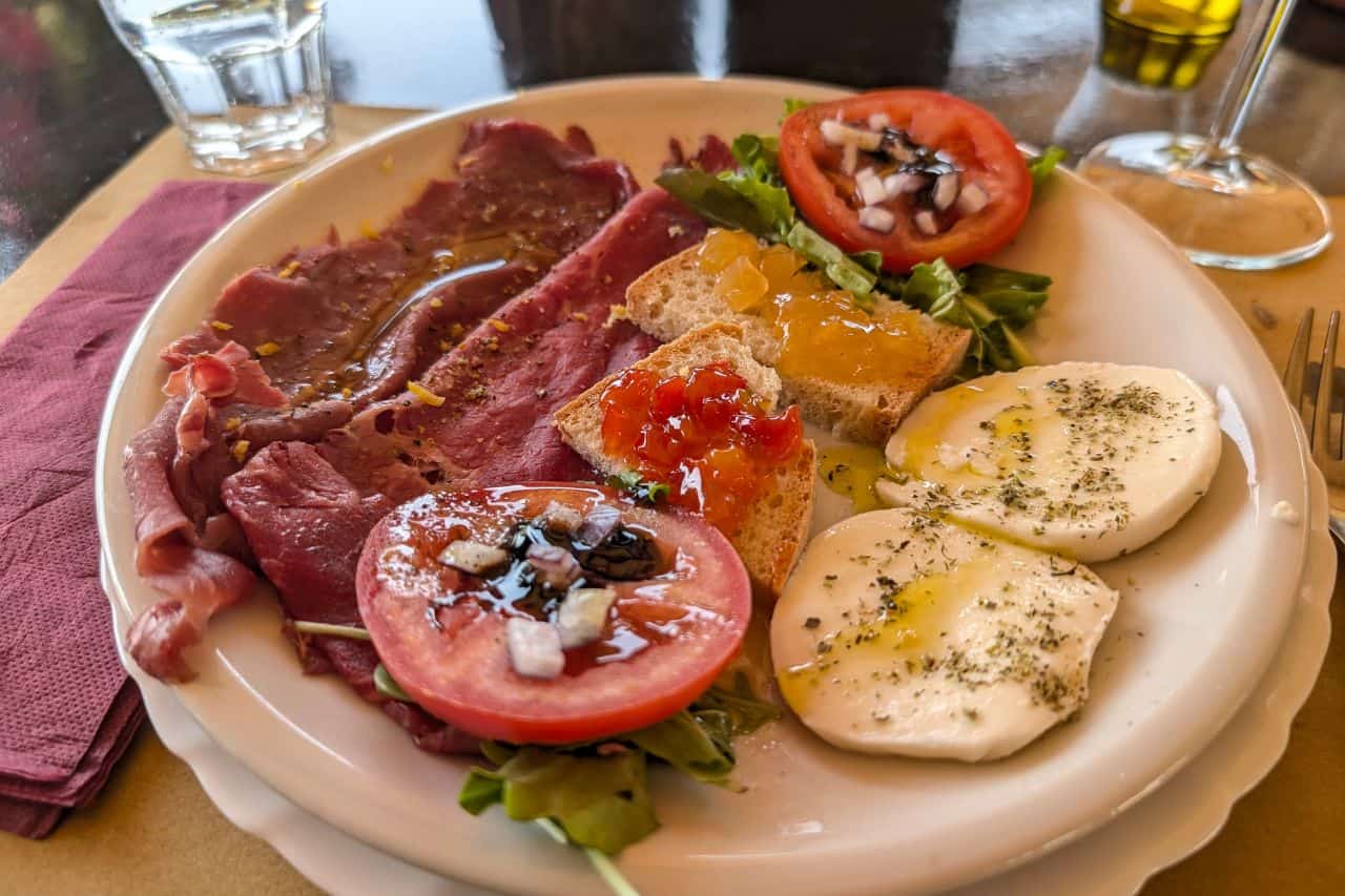 Fresh Veggies and Meat Platter at a Winery Near Lucca Platter of fresh vegetables and cured meats served during a wine tasting near Lucca Italy