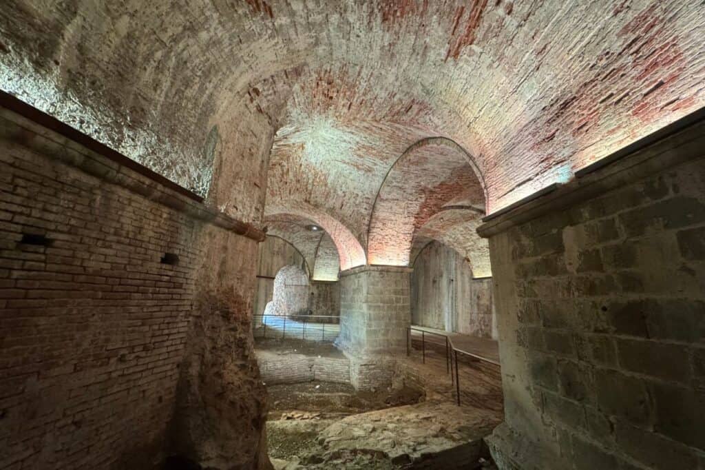 Ancient archways and stone covering the inside of the Lucca walls