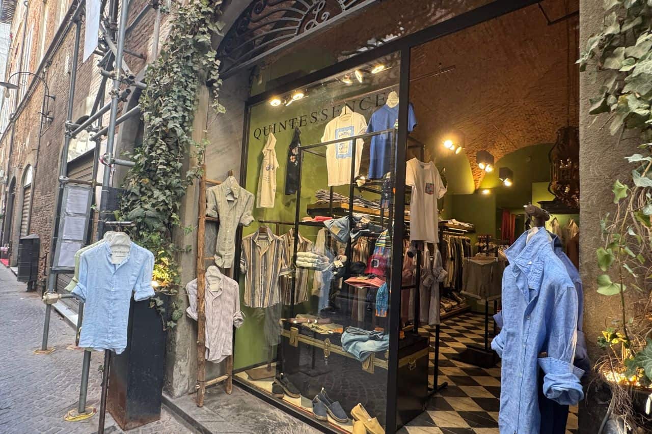 Linen Clothing Shop in Lucca Italy Boutique in Lucca Italy displaying natural linen clothing in soft colors, popular for local window shopping