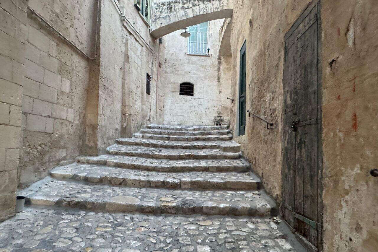 Stone Stairs in Matera Wide stone staircase going under an underpass in Matera